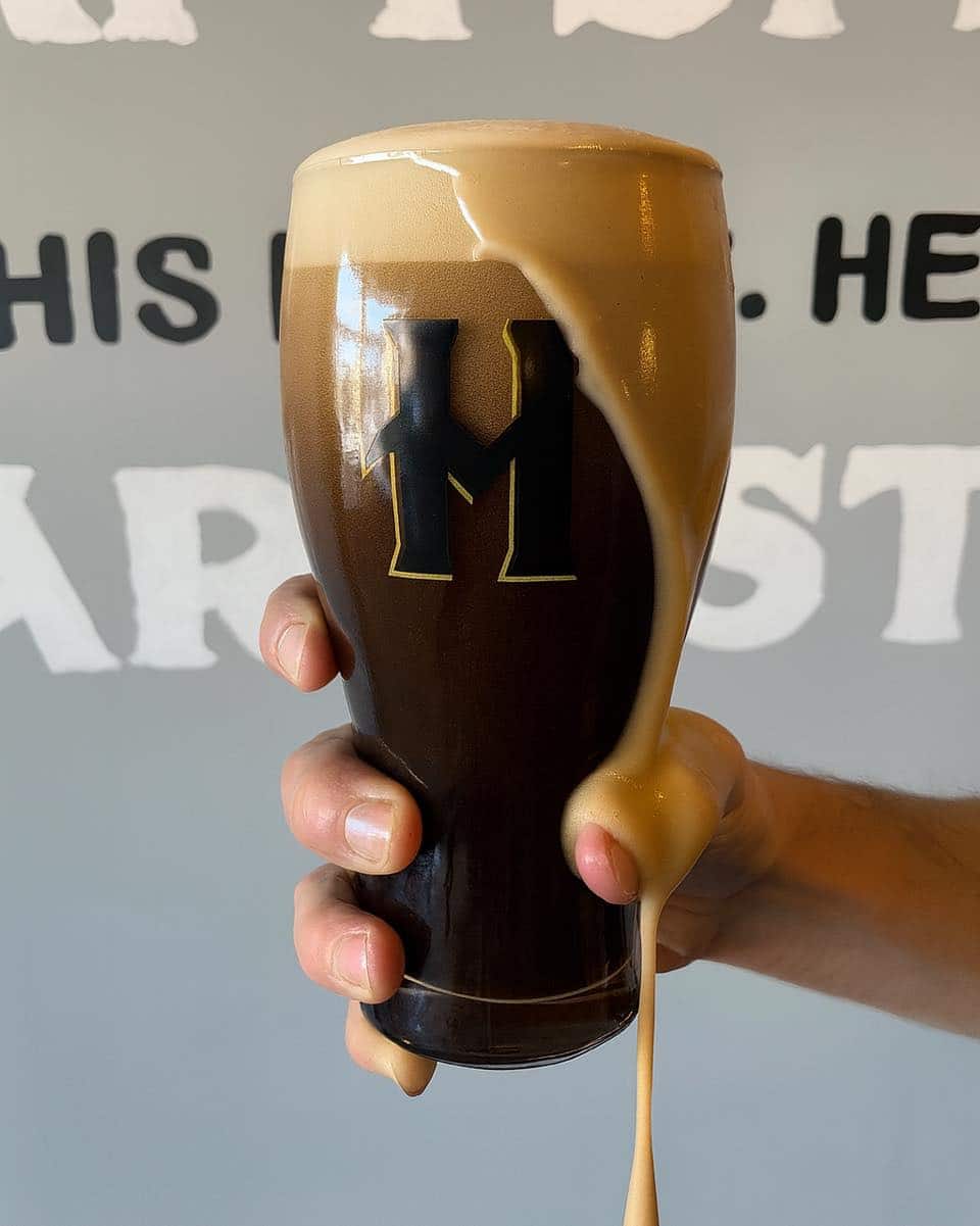 Dark craft beer at Hemauer Brewing Co. Dark beer in a Hemauer Brewing Co. pint glass in Mechanicsburg, PA.