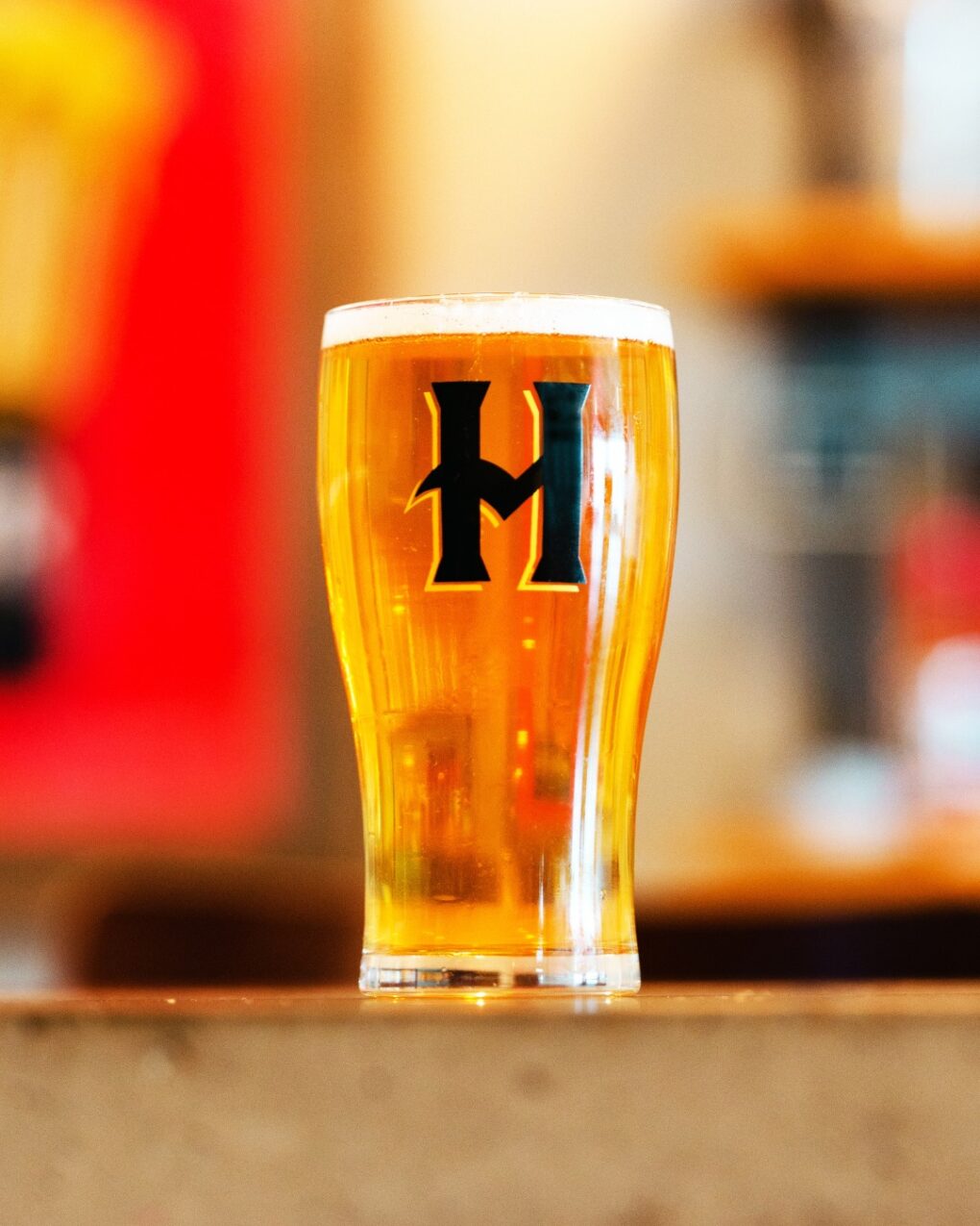 Golden craft beer at Hemauer Brewing Co. Golden beer in a Hemauer Brewing Co. pint glass in Mechanicsburg, PA.